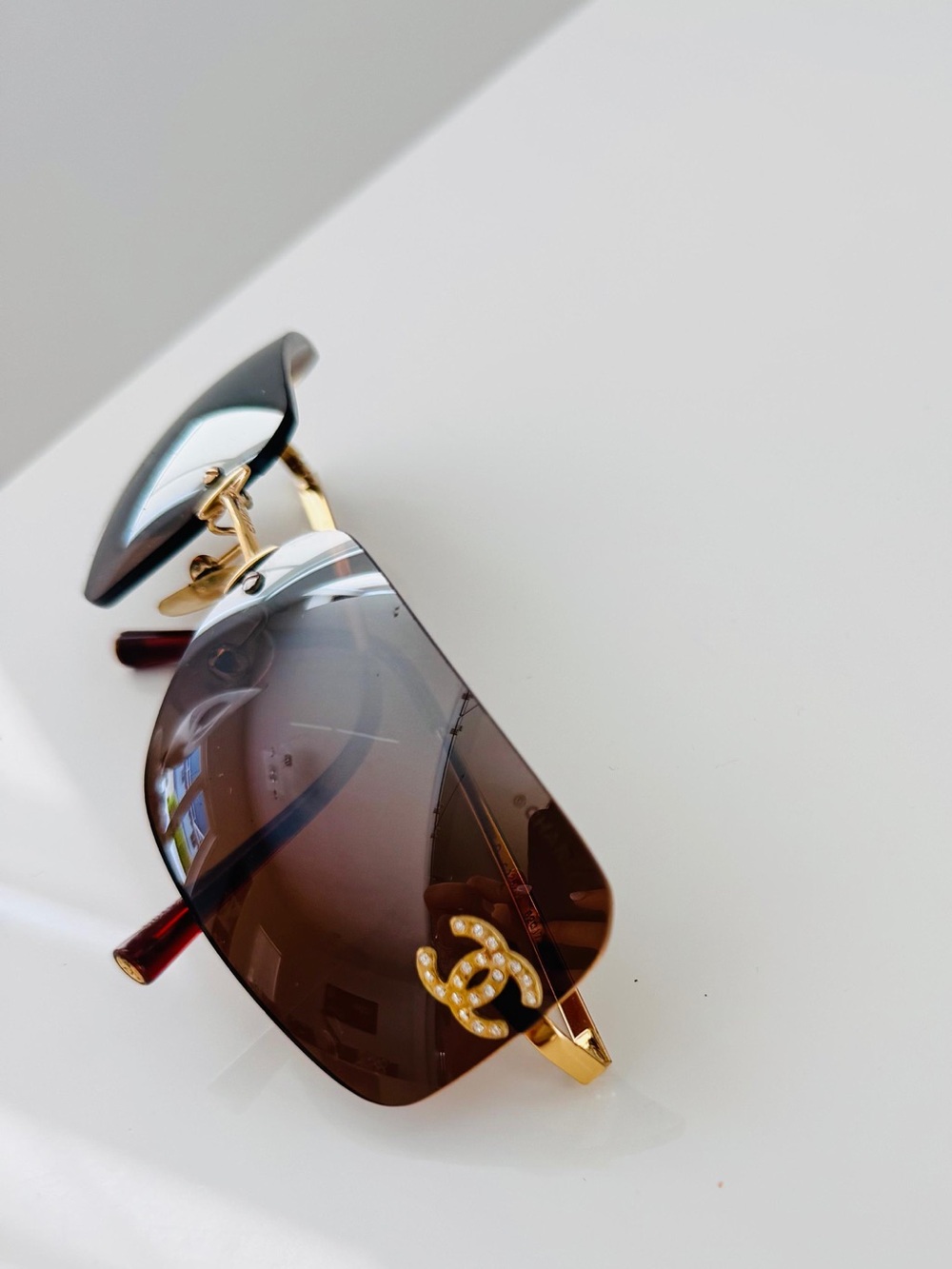CHANEL Brown Rimless Sunglasses with Gold CC Accents